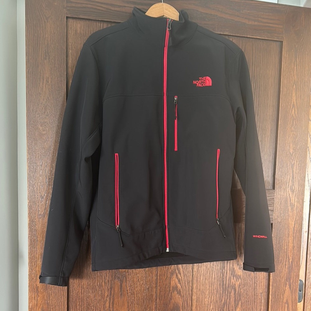 The North Face Men's Black Jacket with Red Accents